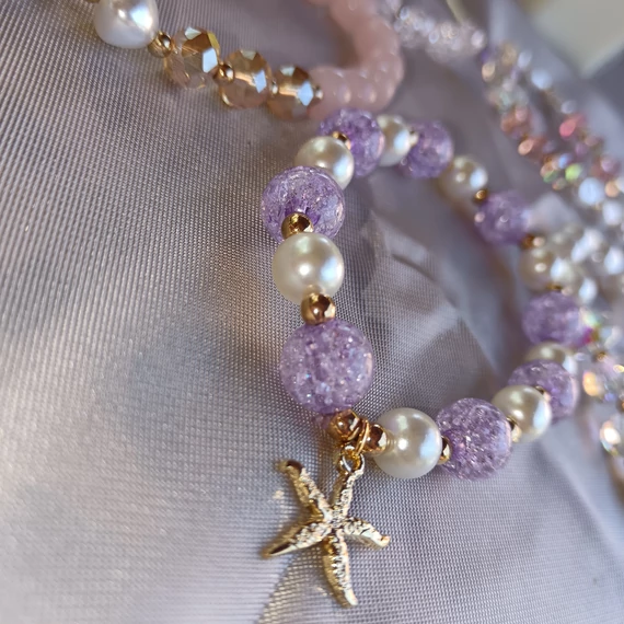 Lila tengericsillagos karkötő