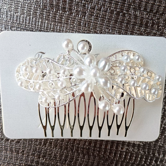 Lepkés kontyba való fésű