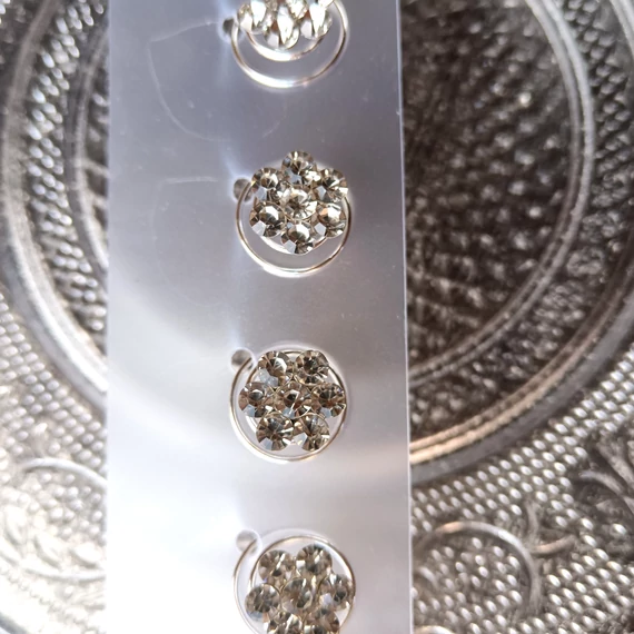 Virágos hajtűspirál